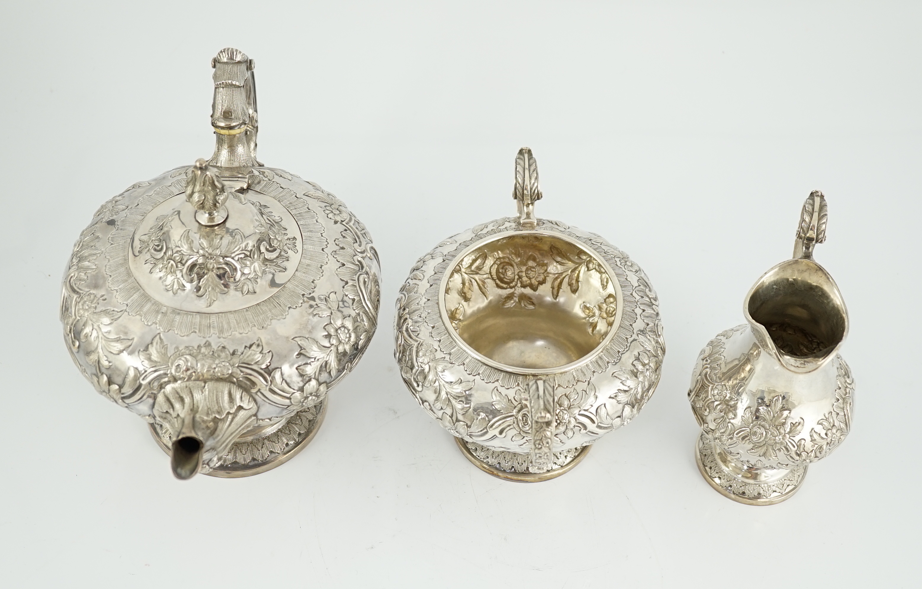 A Victorian silver inverted pear shaped three piece tea set by John Wellby